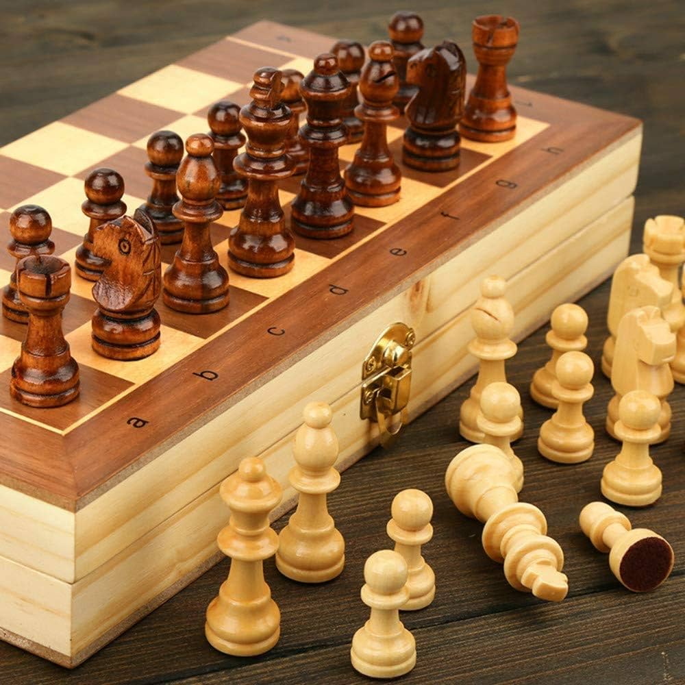 Hand-carved wooden chess set on a board