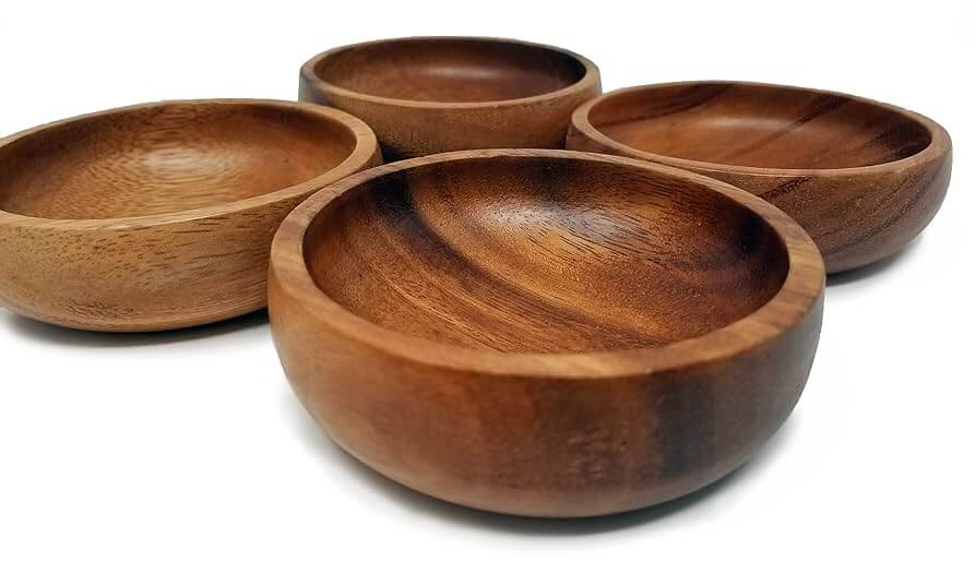 A set of carved wooden bowls with beautiful grain